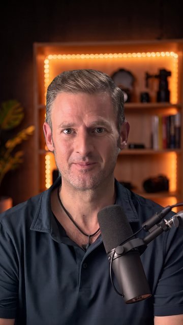The AI twin of me, in the studio, with a microphone in front